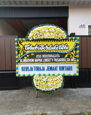 Papan Bunga Duka di Belat